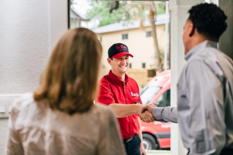 A Mr. Rooter plumber arriving to assist with a plumbing repair in Alameda, CA.