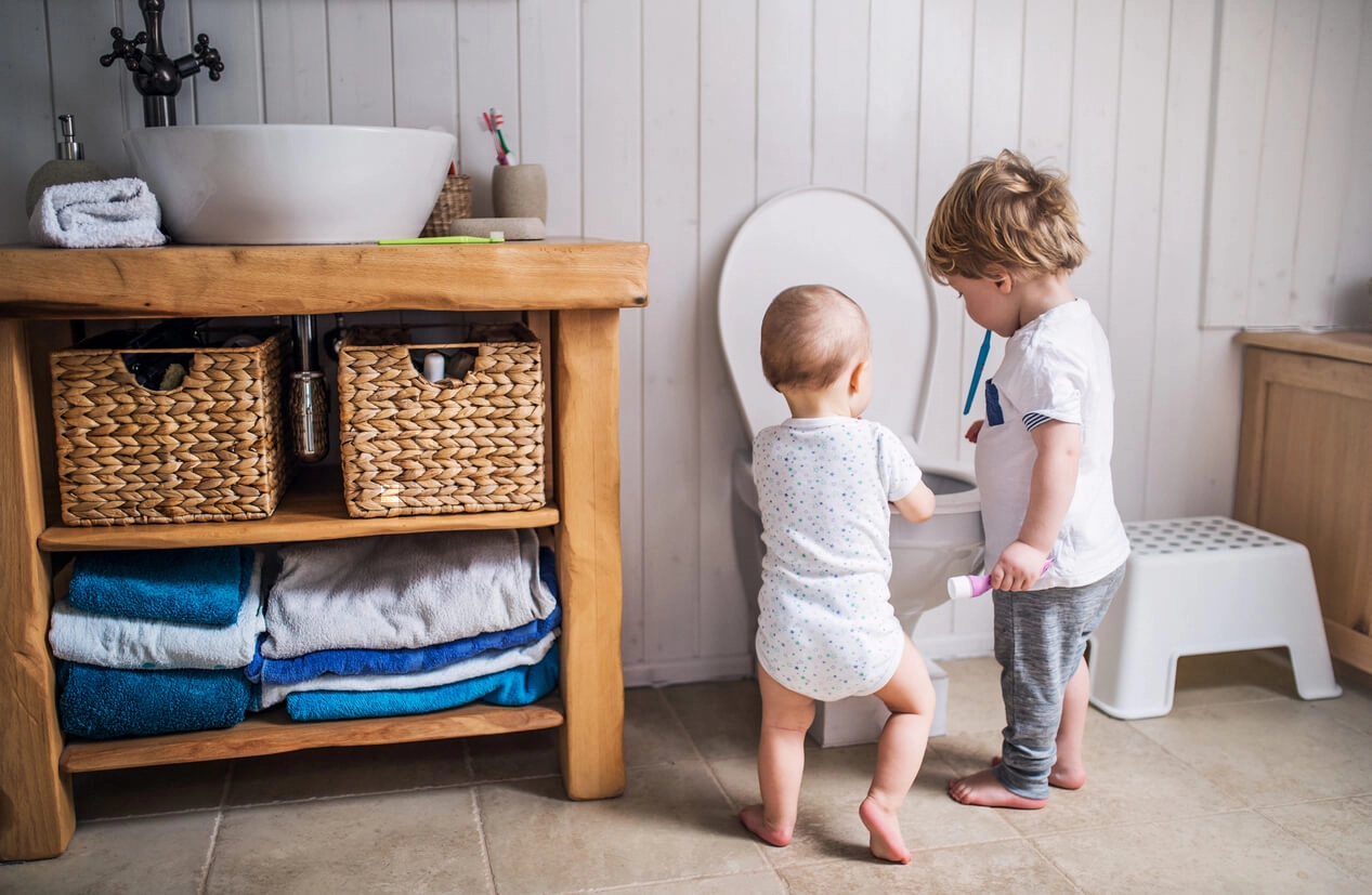 little kids near toilet