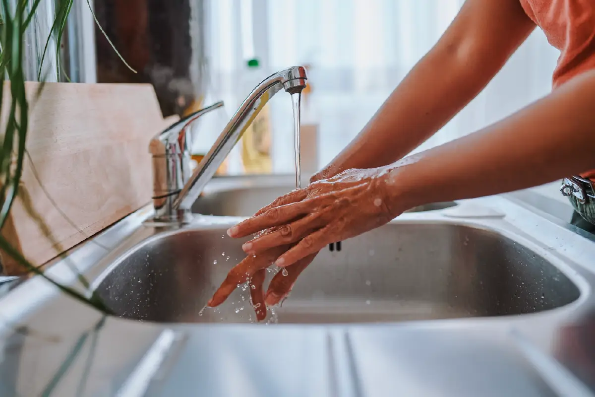 A running faucet releasing clean water