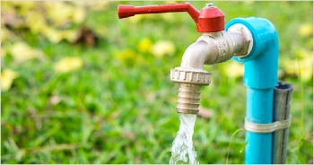 Water flowing from spigot.