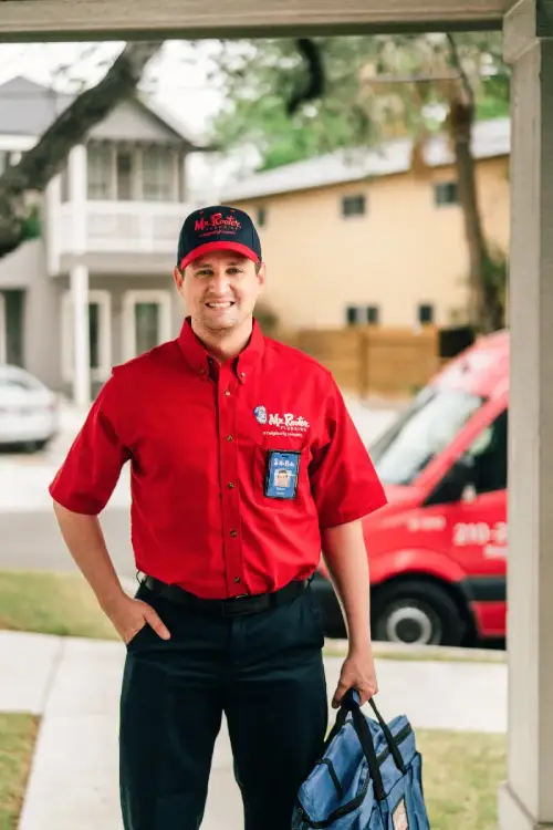 Mr. Rooter plumber arriving to perform video camera inspection