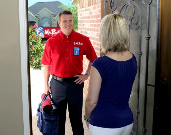 Goddard Mr. Rooter plumber at the door