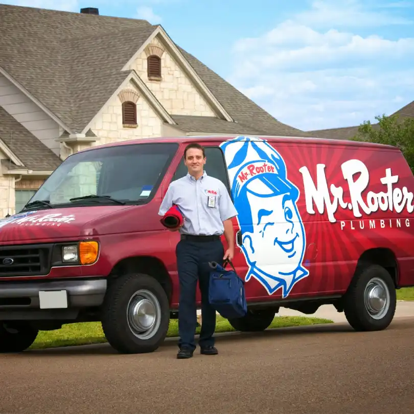 a plumber from mrr plumbing carrying tools used for clearing clogged drains in columbia-sc.