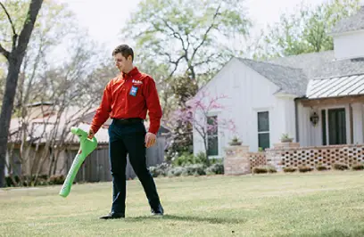 Mr. Rooter Plumber diagnosing a problem with a blockage detection tool.