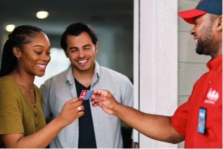 Mr. Rooter plumber greeting customers before doing water line replacement.