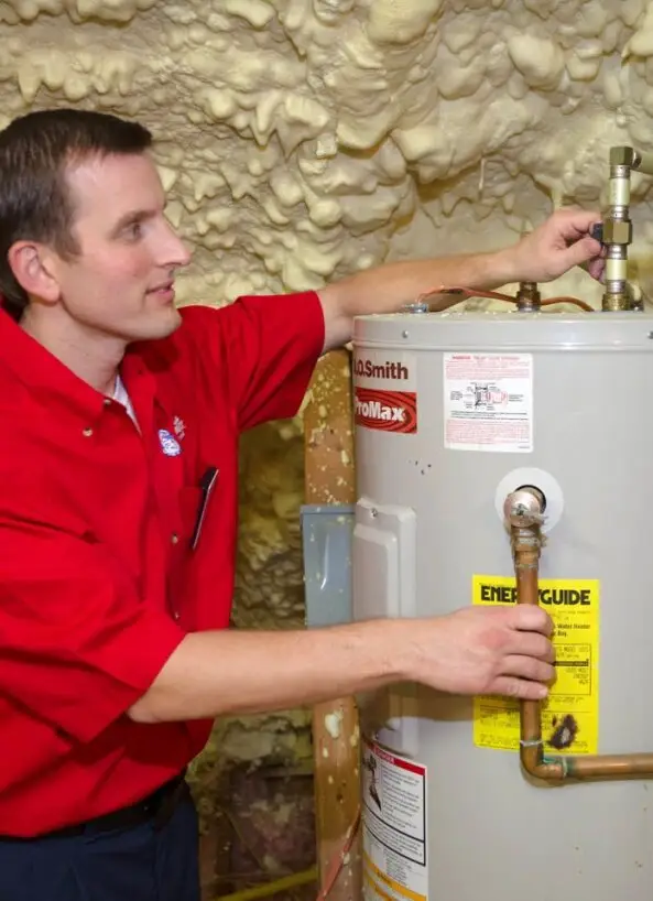 mrr technician inspecting water heater.