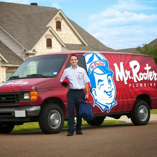  A plumber from Mr. Rooter Plumbing carrying a bag of tools used for water softener repair in San Antonio, TX.