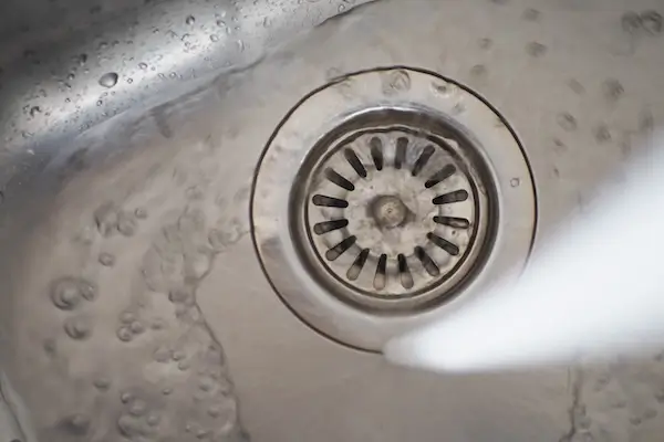 Water backing up in a sink that requires drain services 